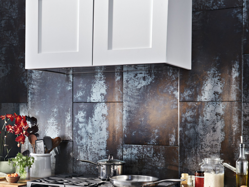 A range hood liner with ingredients on a counter nearby. A range hood liner with ingredients on a counter nearby.